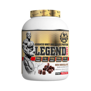 A large white tub of GNC Legend Whey Rich Chocolate protein powder with a gold and black label, featuring a muscular bodybuilder graphic and chocolate pieces on the front.