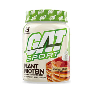 A jar of GAT Sport Plant Protein powder with Pancakes and Syrup-flavored pancakes and syrup flavor, featuring a green and white branded label and lid.
