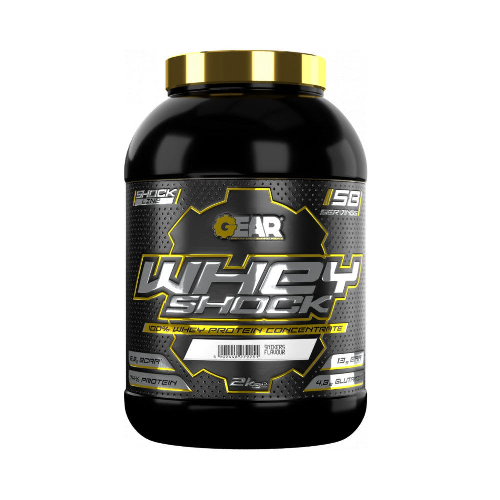 A 2kg black tub of Gear Whey Shock protein powder with a gold cap, shown on a plain white background.