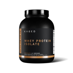 A black plastic tub of Kaged Whey Protein Isolate in chocolate flavor, featuring a black label with gold lettering and a vertical brown side tab, set against a plain white background.