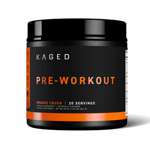 A black plastic tub of Kaged Pre-Workout supplement in the Orange Crush flavor, featuring a black label with orange and white text, set against a plain white background.