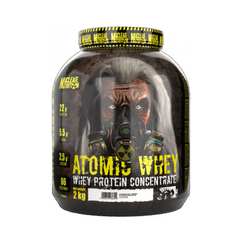 A 2 kg tub of Nuclear Nutrition Atomic Whey Whey Protein Concentrate in Chocolate flavor, featuring a dark, gritty label with a gas mask graphic and yellow text.