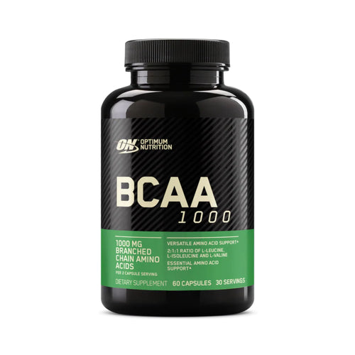 A black bottle of Optimum Nutrition BCAA 1000 dietary supplement with a black ribbed cap, featuring a black and white label with a green band at the bottom, on a white background.