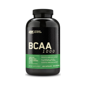 A black plastic bottle of Optimum Nutrition BCAA 1000 dietary supplement with a black cap, featuring a black label with white text and a green band at the bottom, on a white background.
