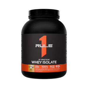 A black tub of Rule 1 Protein Whey Isolate powder on a plain white background, featuring a black label with a large orange number 1 and white text.