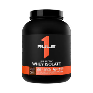 A black plastic tub of Rule 1 Whey Isolate protein powder in chocolate flavor, featuring a black label with a prominent orange number 1 and white text.