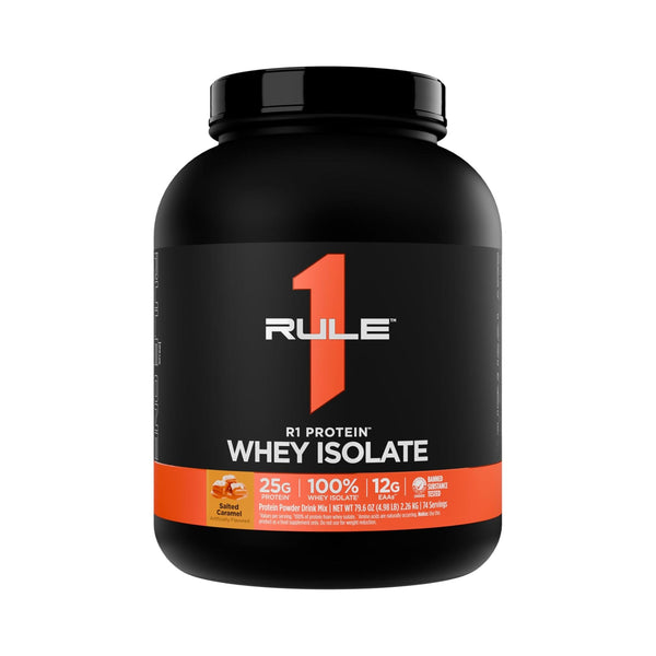 A black tub of Rule 1 Whey Isolate protein powder with a black label featuring a large orange number 1 and white text, on a plain white background.
