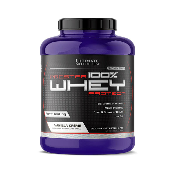 A tub of Ultimate Nutrition Prostar 100% Whey Protein in Vanilla Crème flavor, featuring a dark purple container with a black and gray label.