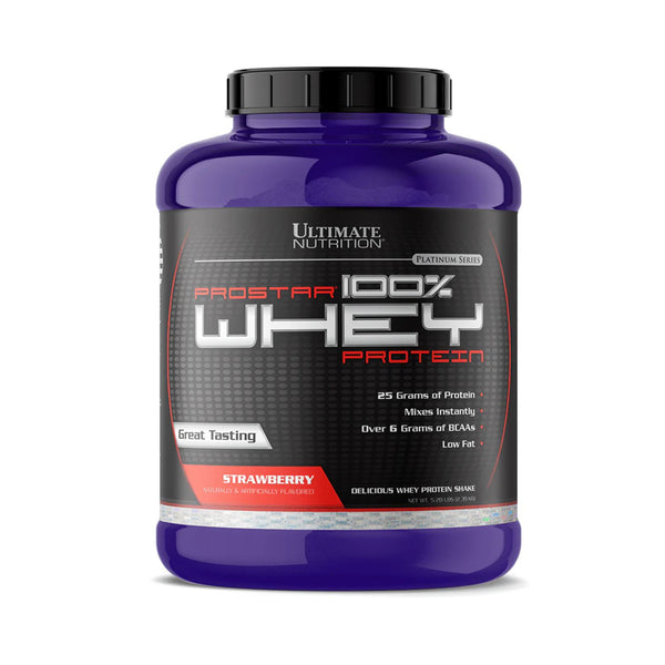 A purple plastic tub of Ultimate Nutrition Prostar 100% Whey Protein in Strawberry flavor, featuring a black and red label with a black cap, set against a plain white background.